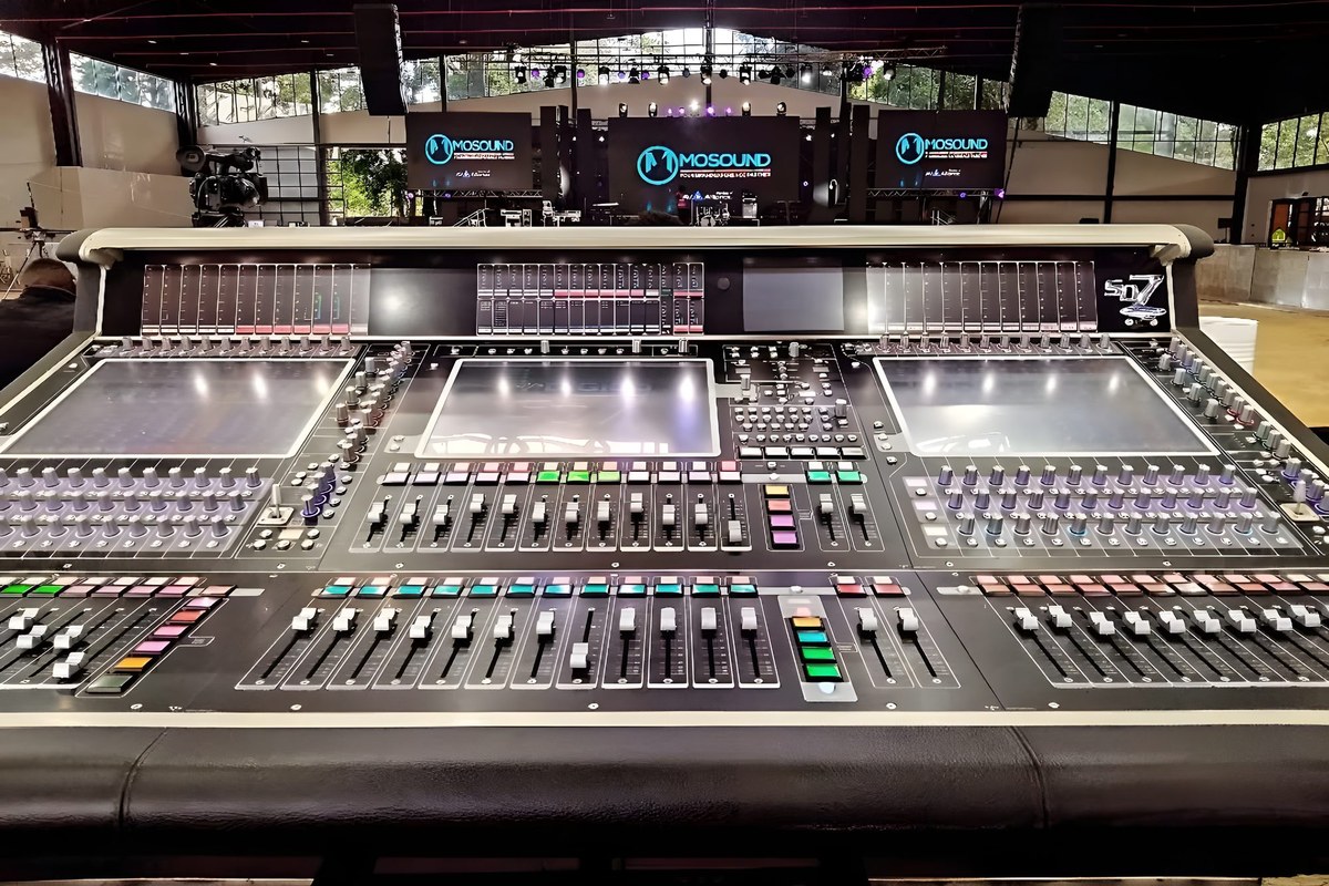 A large-format digital mixing console run by MoSound engineers
